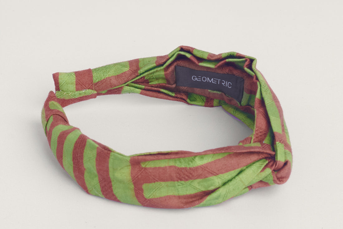 Green and brown hand-dyed batik Garden Party print headband by GEOMETRIC.