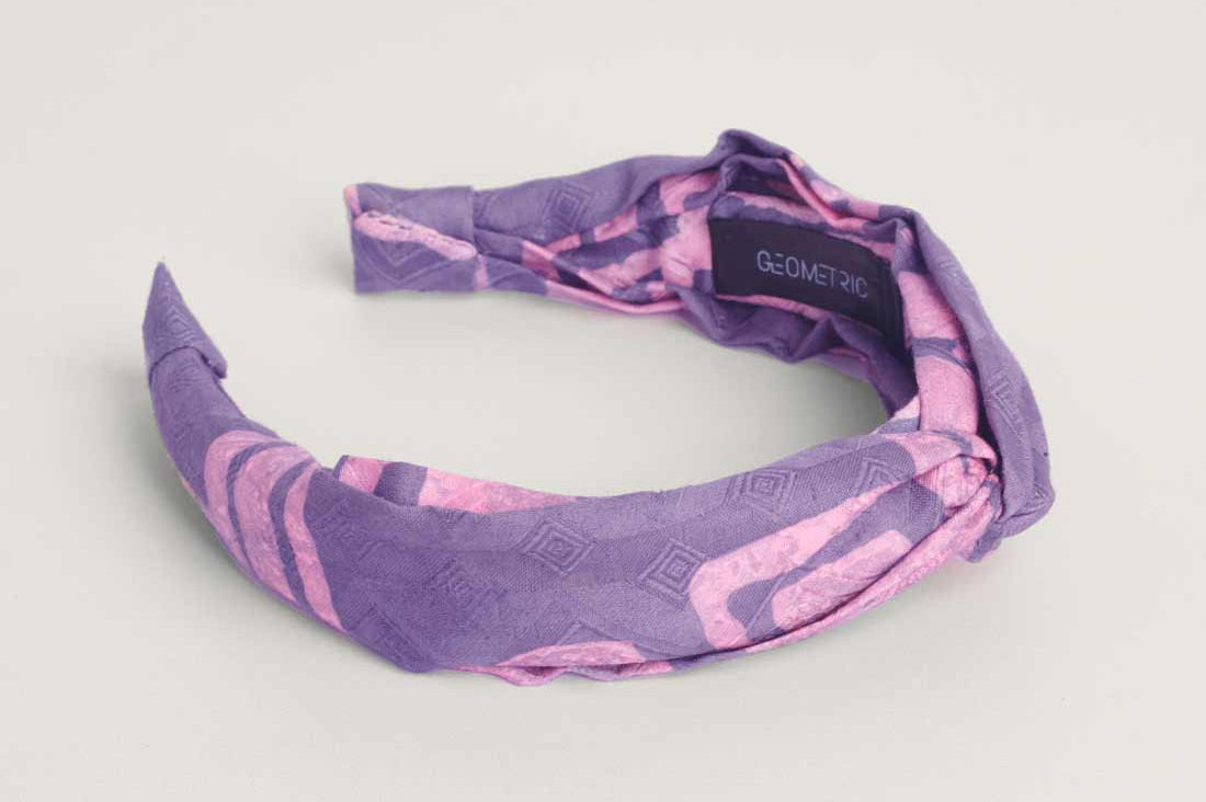 Pink and purple hand-dyed Coco batik print headband by GEOMETRIC.