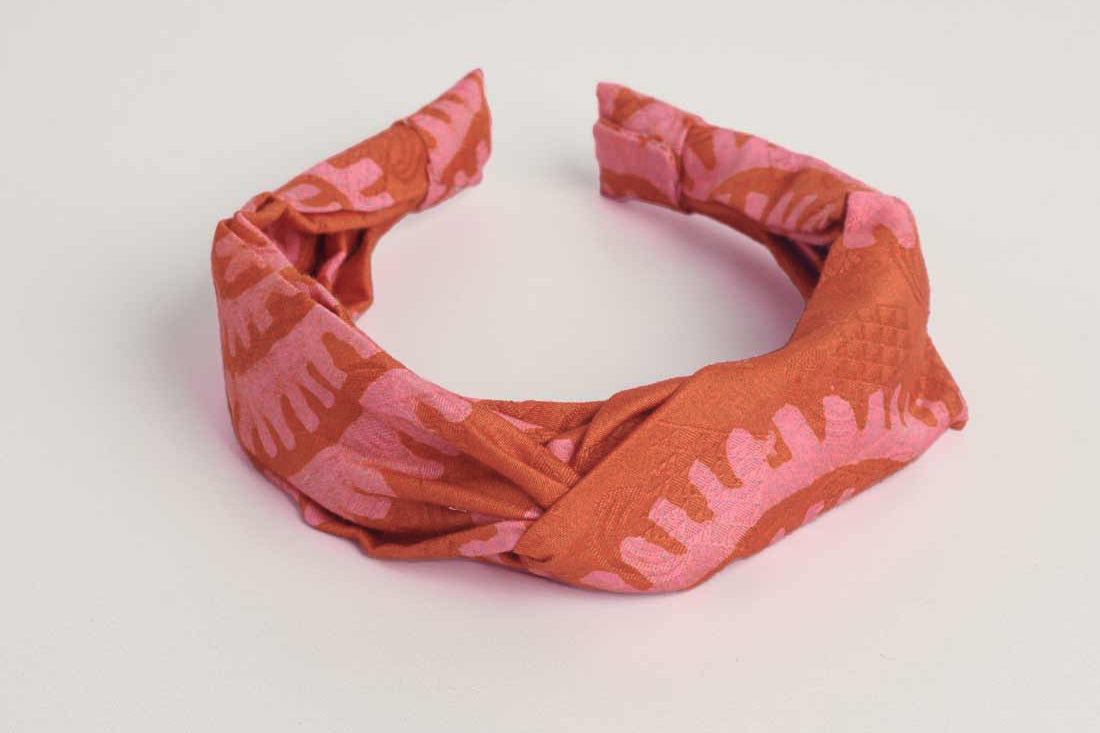 Red hand-dyed batik Shea Shell print headband by GEOMETRIC.