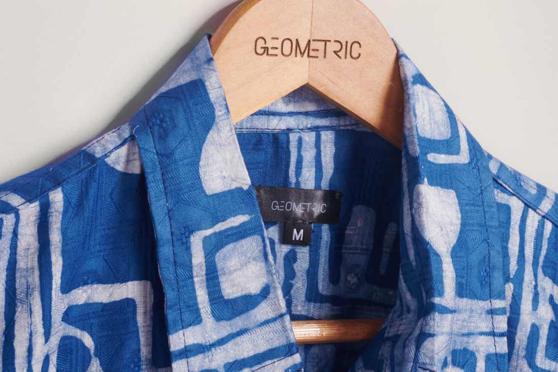 Hand-dyed blue Coco batik print short sleeve button up shirt by GEOMETRIC.