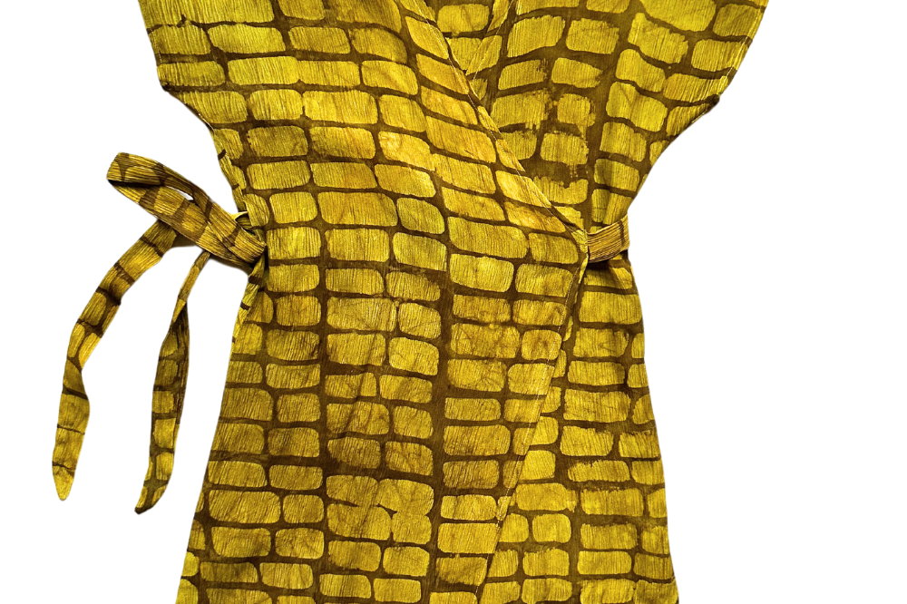 Hand-dyed yellow techno wrap dress by GEOMETRIC. 
