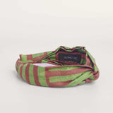 Green and brown hand-dyed batik Garden Party print headband by GEOMETRIC. 