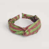 Green and brown hand-dyed batik Garden Party print headband by GEOMETRIC. 