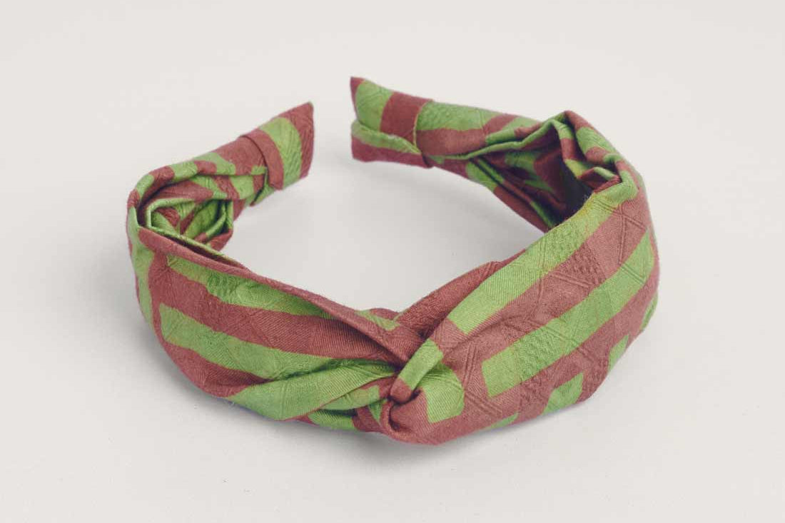 Green and brown hand-dyed batik Garden Party print headband by GEOMETRIC. 
