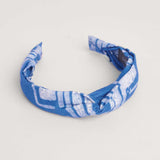 Blue hand-dyed batik Coco print headband by GEOMETRIC. 