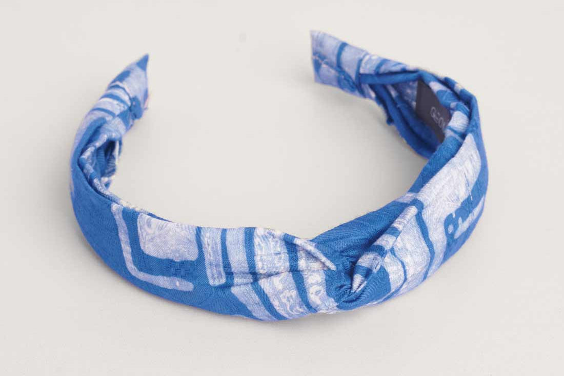 Blue hand-dyed batik Coco print headband by GEOMETRIC. 