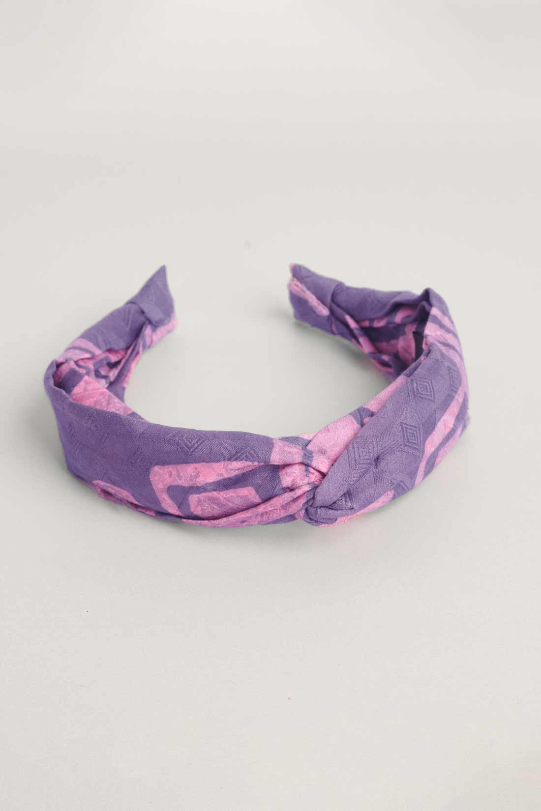 Pink and purple hand-dyed Coco batik print headband by GEOMETRIC. 