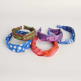 Set of 5 hand-dyed batik print headbands by GEOMETRIC. 