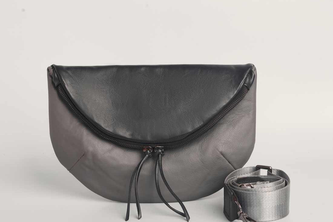 Charcoal leather Crescent cross-body bag by Geometric. 