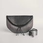 Charcoal leather Crescent cross-body bag by Geometric. 