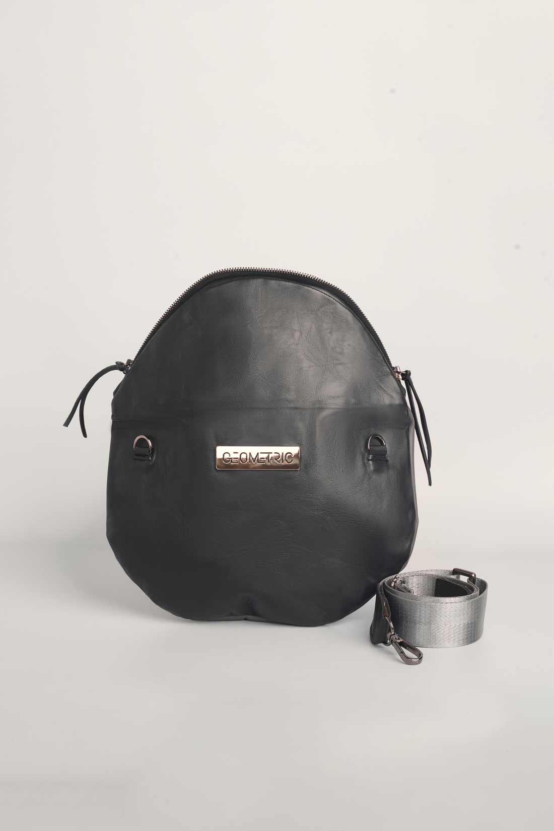 Charcoal leather Crescent cross-body bag by Geometric. 