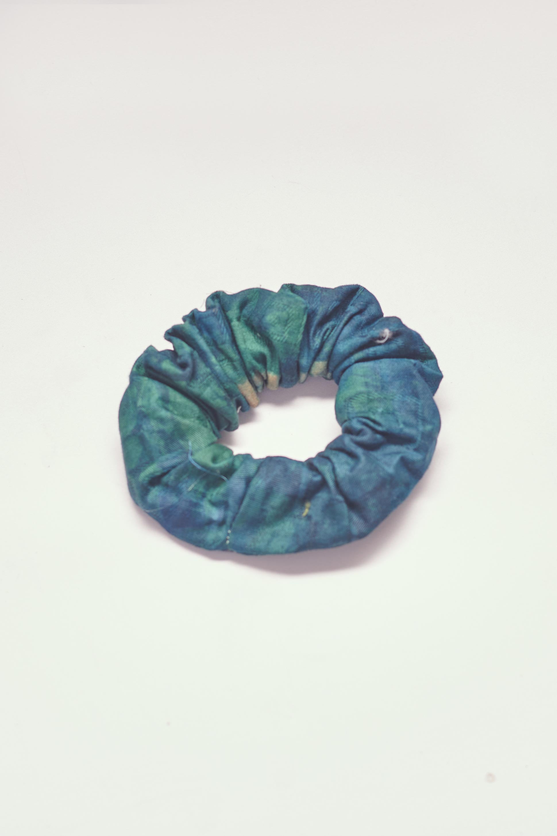 Blue hand-dyed batik Brushstrokes print scrunchie by GEOMETRIC. 