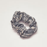 Charcoal hand-dyed Coco batik print scrunchy by GEOMETRIC. 
