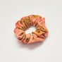 Orange hand-dyed batik Birds of Paradise scrunchie by GEOMETRIC.