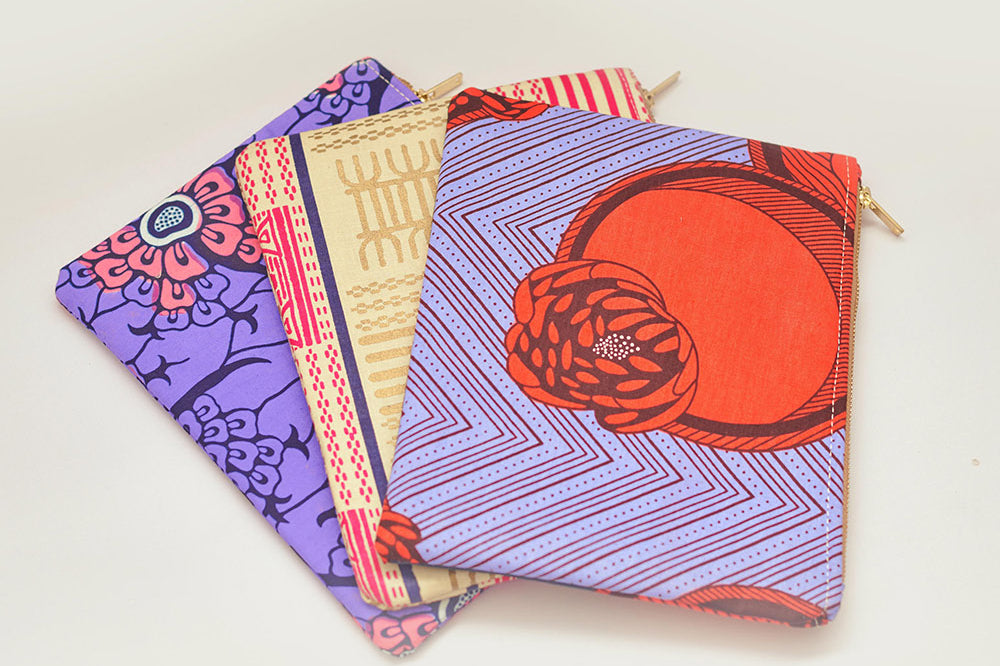 Set of three batik print Zipper Clutch bags by GEOMETRIC. 