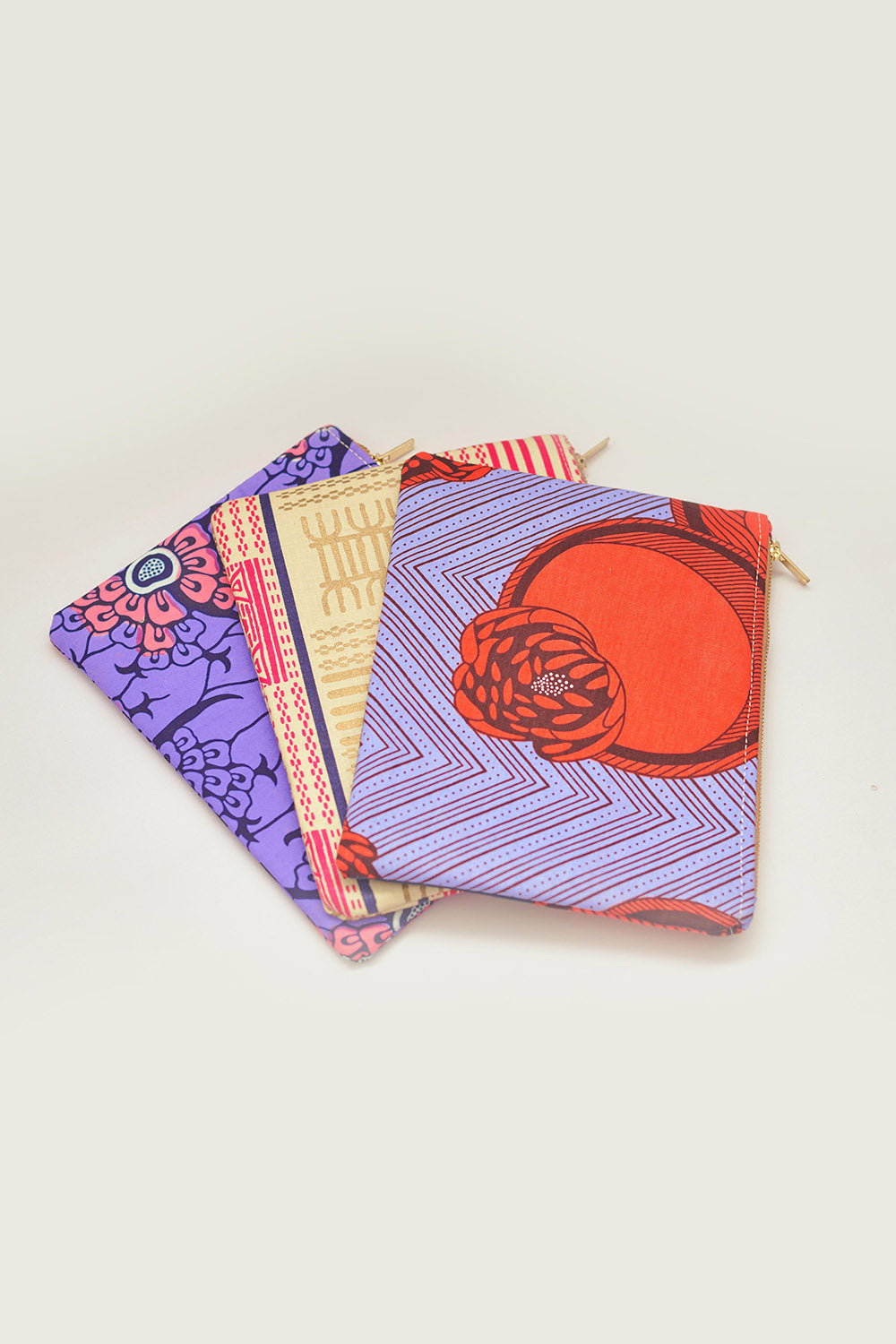 Set of three hand-dyed Zipper Clutch bags by GEOMETRIC. 