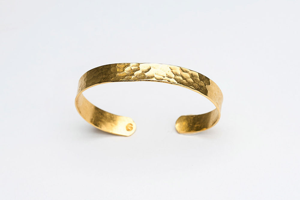 Hammered brass cuff bracelet by GEOMETRIC. 