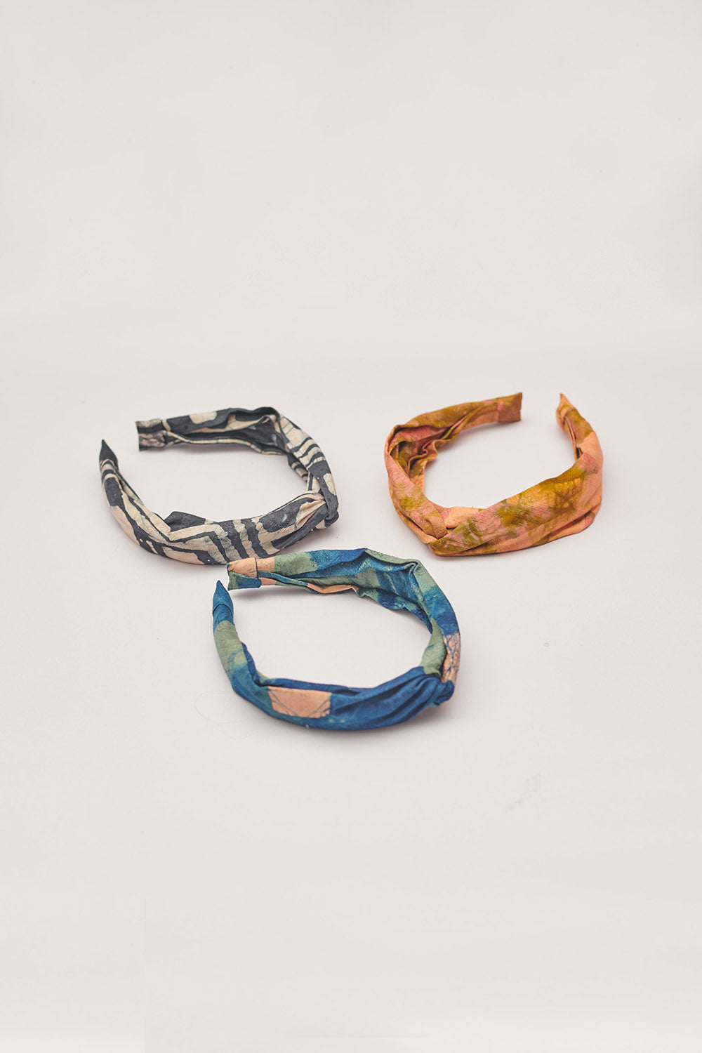 Set of 3 hand-dyed batik print headbands by GEOMETRIC. 