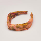 Orange hand-dyed batik Birds of Paradise print headband by GEOMETRIC. 