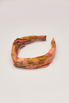 Orange hand-dyed batik Birds of Paradise print headband by GEOMETRIC. 