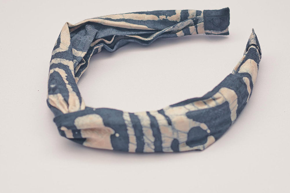 Charcoal hand-dyed batik Coco print headband by GEOMETRIC. 