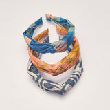 Set of three hand-dyed batik print headbands by Geometric. 
