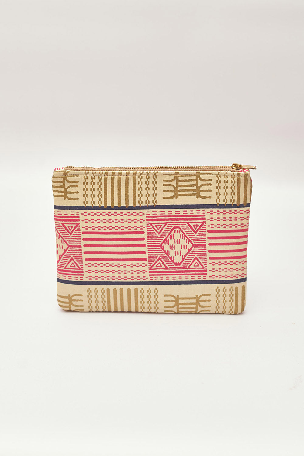 Tan and pink hand-dyed Kente print Zipper Clutch by GEOMETRIC.