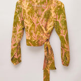 Hand-dyed orange Birds of Paradise batik print long sleeve wrap top by GEOMETRIC. 