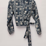 Charcoal hand-dyed batik Coco print long sleeve wrap top by GEOMETRIC. 