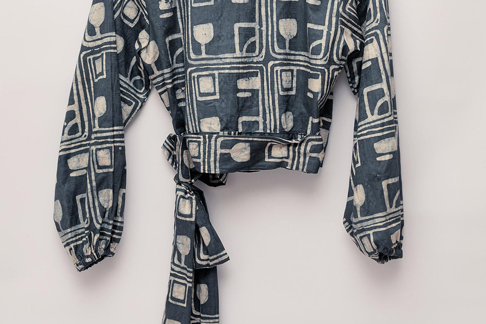 Charcoal hand-dyed batik Coco print long sleeve wrap top by GEOMETRIC. 