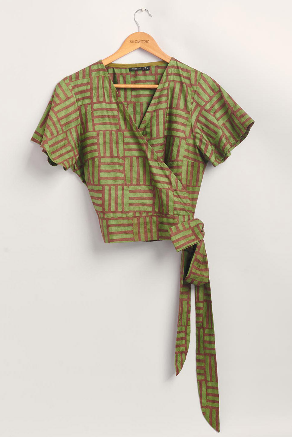 Hand-dyed green and brown Garden Party batik print Short Sleeve Wrap Top by GEOMETRIC. 