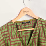 Hand-dyed green and brown Garden Party batik print Short Sleeve Wrap Top by GEOMETRIC. 