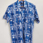 Hand-dyed blue Coco batik print short sleeve button up shirt by GEOMETRIC. 