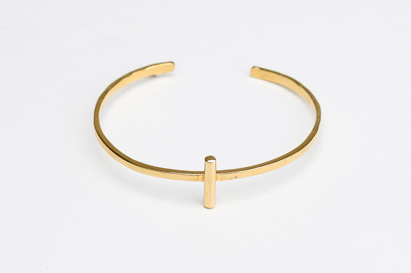 Brass stitched cuff bracelet by GEOMETRIC. 