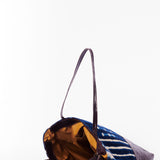Inside view of hand-dyed indigo fabric and leather Tema tote bag by GEOMETRIC. 